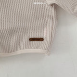 Soft beige Monica Hoodie from Bebeholic, perfect for babies with its cozy waffle texture and stylish neutral colors.